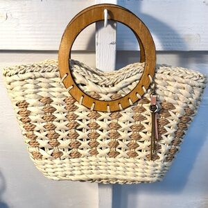 Designer straw wood handle clutch with charm